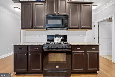 Kitchen - 835 Ideal Pl, Winder, GA 30680 photo 5 of 5