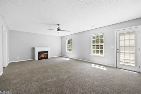 Living - 1883 Simmons Ln, Hampton, GA 30228 photo 3 of 3
