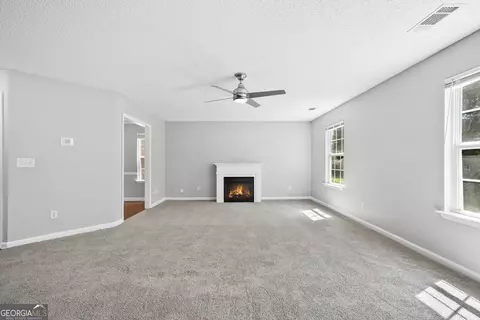 Living - 1883 Simmons Ln, Hampton, GA 30228 photo 1 of 3