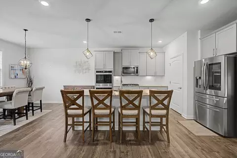 Kitchen - 7442 Jennadee Dr, Fairburn, GA 30213 photo 3 of 4