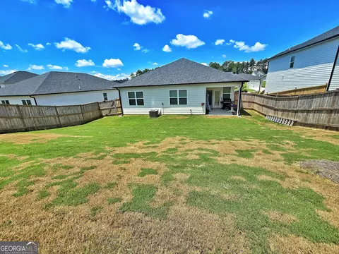 Exterior - 134 Oakchase Park Ln, Hampton, GA 30228 photo 4 of 7