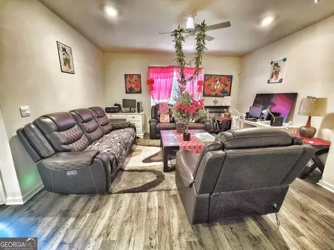 Living - 134 Oakchase Park Ln, Hampton, GA 30228 photo 1 of 2