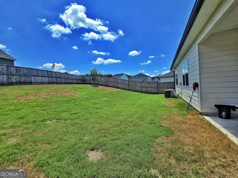 Exterior - 134 Oakchase Park Ln, Hampton, GA 30228 photo 3 of 7