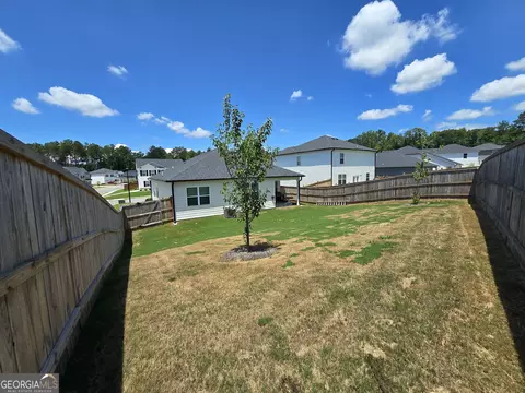 Exterior - 134 Oakchase Park Ln, Hampton, GA 30228 photo 5 of 7