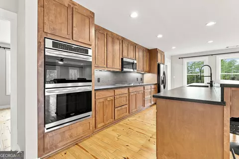 Kitchen - 425 Ethridge Mill Rd, Milner, GA 30257 photo 3 of 5