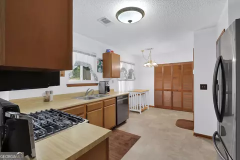 Kitchen - 2425 Rhoanoke Dr, Duluth, GA 30096 photo 2 of 2