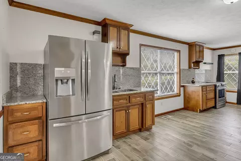 Kitchen - 1296 Mcquaig St NW, Cairo, GA 39828 photo 8 of 8