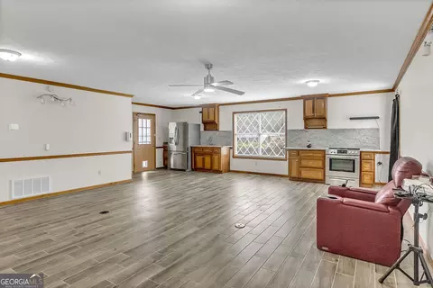 Living - 1296 Mcquaig St NW, Cairo, GA 39828 photo 3 of 19
