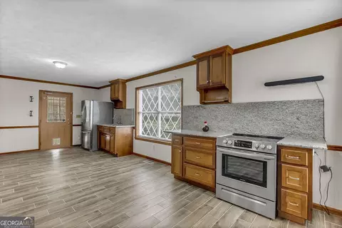 Kitchen - 1296 Mcquaig St NW, Cairo, GA 39828 photo 7 of 8