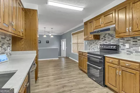Kitchen - 1296 Mcquaig St NW, Cairo, GA 39828 photo 5 of 8