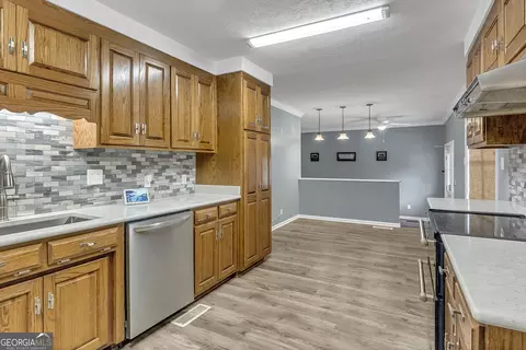 Kitchen - 1296 Mcquaig St NW, Cairo, GA 39828 photo 4 of 8