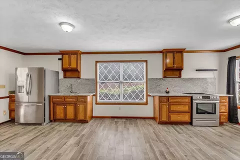 Kitchen - 1296 Mcquaig St NW, Cairo, GA 39828 photo 6 of 8