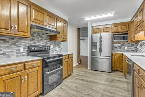 Kitchen - 1296 Mcquaig St NW, Cairo, GA 39828 photo 3 of 8
