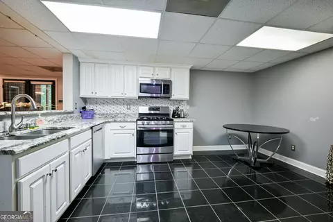Kitchen - 12426 Edgewater Dr, Hampton, GA 30228 photo 5 of 5