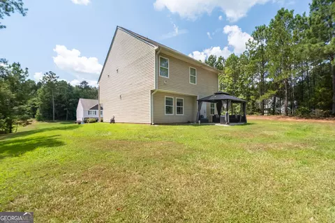 Exterior - 105 Oakbrook Ln, Covington, GA 30016 photo 6 of 9