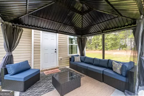 Exterior - 105 Oakbrook Ln, Covington, GA 30016 photo 8 of 9