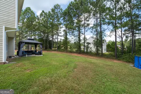 Exterior - 105 Oakbrook Ln, Covington, GA 30016 photo 5 of 9