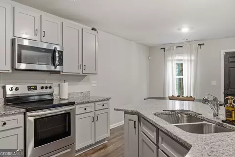 Kitchen - 105 Oakbrook Ln, Covington, GA 30016 photo 2 of 4