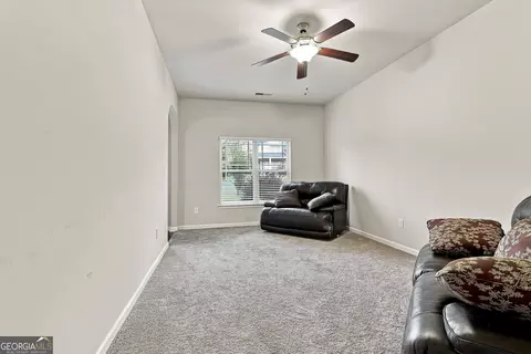 Living - 613 Oakville Trl, Hampton, GA 30228 photo 2 of 3