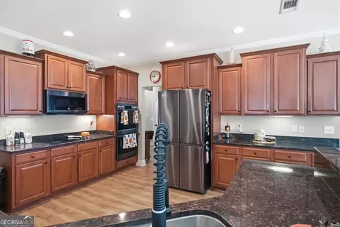 Kitchen - 10 Toscanno Dr, Covington, GA 30014 photo 2 of 2