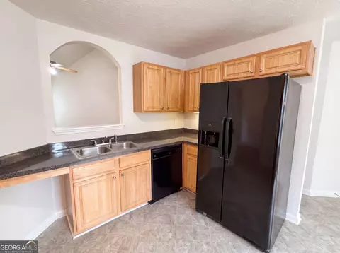 Kitchen - 55 Lassiter Dr, Covington, GA 30016 photo 2 of 3