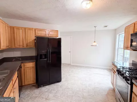 Kitchen - 55 Lassiter Dr, Covington, GA 30016 photo 1 of 3