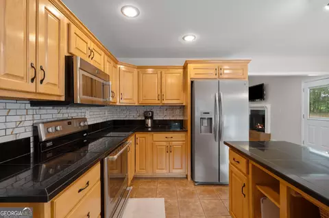 Kitchen - 350 E Harp Rd, Thomaston, GA 30286 photo 5 of 9