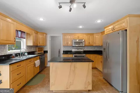 Kitchen - 350 E Harp Rd, Thomaston, GA 30286 photo 2 of 9