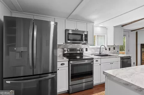 Kitchen - 350 E Harp Rd, Thomaston, GA 30286 photo 7 of 9
