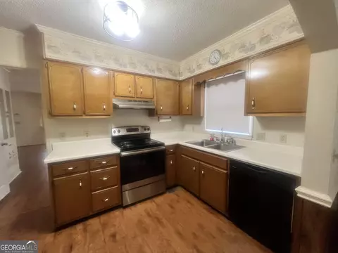 Kitchen - 127 W Stuart Ave, Lyons, GA 30436 photo 1 of 1
