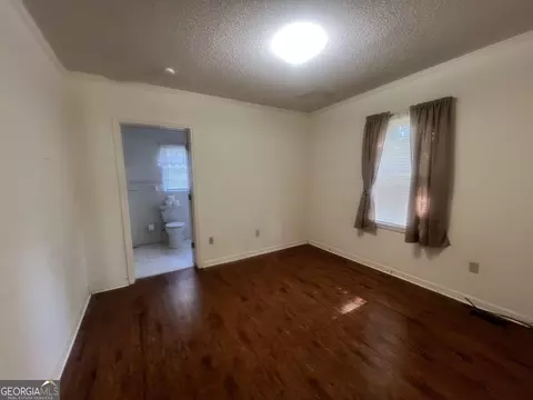 Bedroom - 127 W Stuart Ave, Lyons, GA 30436 photo 1 of 1