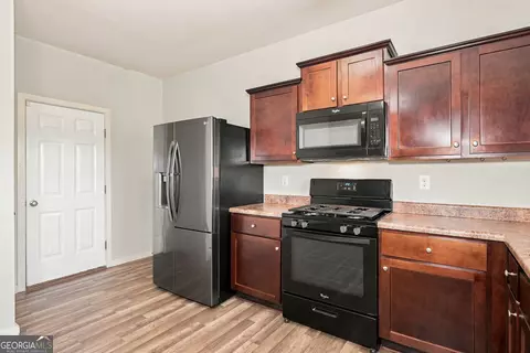 Kitchen - 1043 Sutherland Dr, Winder, GA 30680 photo 2 of 2