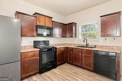 Kitchen - 1043 Sutherland Dr, Winder, GA 30680 photo 1 of 2