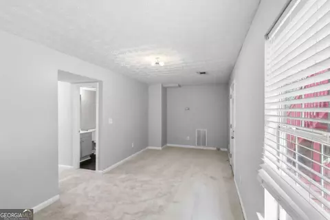 Living - 165 Syracuse Ln, Covington, GA 30016 photo 4 of 5