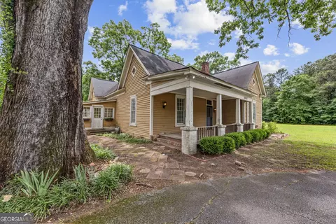 Exterior - 1047 Dixie Rd, Covington, GA 30014 photo 2 of 11