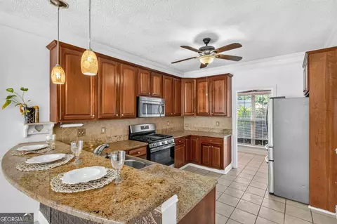 Kitchen - 1137 E Shoreview Rd, Mcdonough, GA 30253 photo 2 of 3