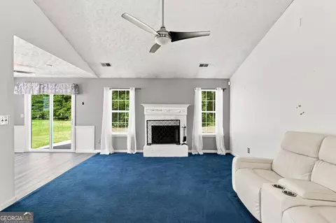 Living - 1648 Graystone Dr, Hampton, GA 30228 photo 2 of 3