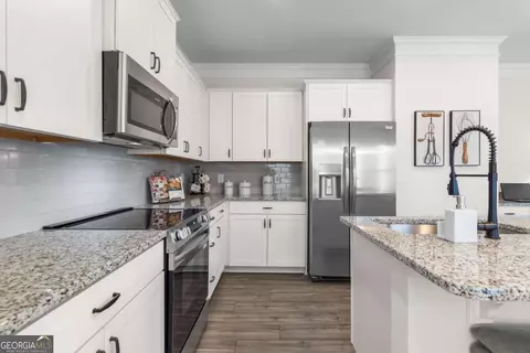 Kitchen - 1491 Trellis Ct #LOT 1, Hampton, GA 30228 photo 4 of 5