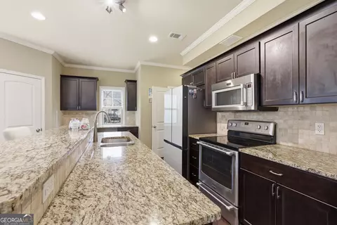 Kitchen - 130 Maple Dr, Commerce, GA 30529 photo 1 of 2