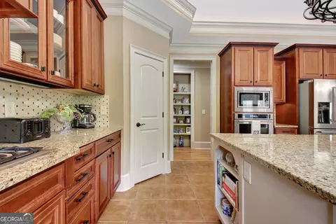 Kitchen - 100 Wickham Dr, Tyrone, GA 30290 photo 7 of 11