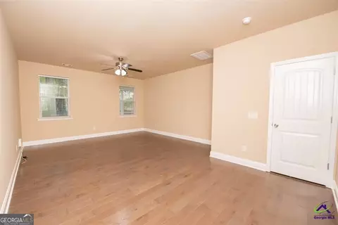 Living - 212 Chrisopher Luke Cir, Perry, GA 31069 photo 6 of 7