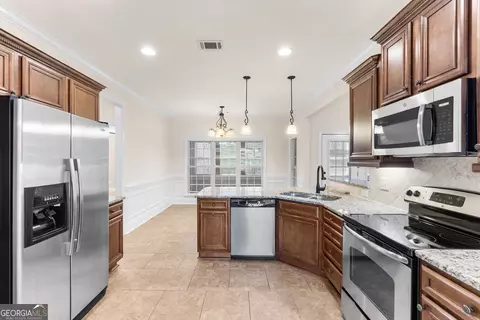 Kitchen - 3003 Hackberry Ter, Bonaire, GA 31005 photo 8 of 8