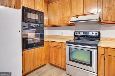 Kitchen - 435 Miller Rd, Covington, GA 30014 photo 3 of 4