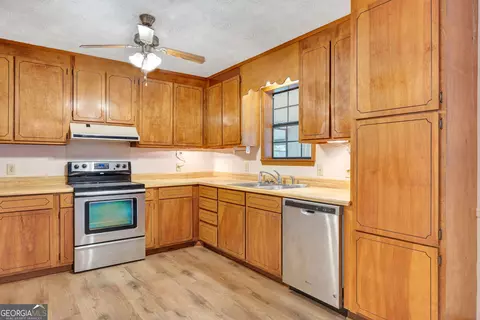 Kitchen - 435 Miller Rd, Covington, GA 30014 photo 2 of 4