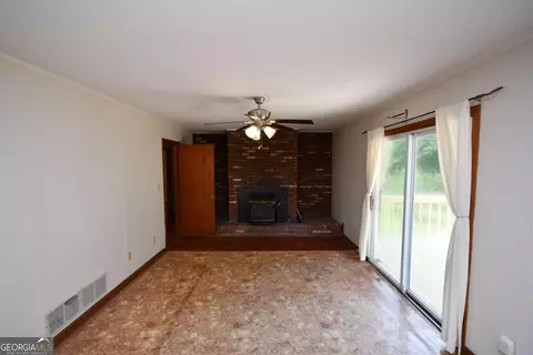 Living - 4 Bill Ploof Rd, Buchanan, GA 30113 photo 4 of 8