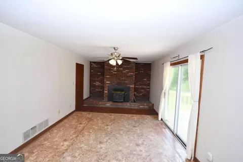 Living - 4 Bill Ploof Rd, Buchanan, GA 30113 photo 6 of 8