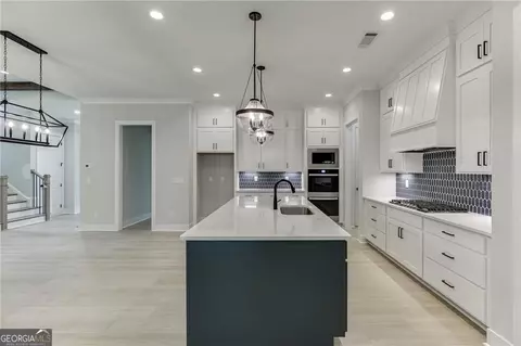 Kitchen - 5370 Settingdown Rd, Cumming, GA 30041 photo 4 of 5