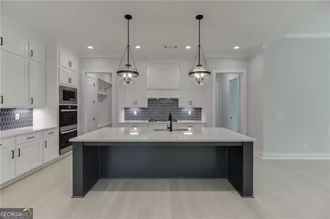 Kitchen - 5370 Settingdown Rd, Cumming, GA 30041 photo 2 of 5