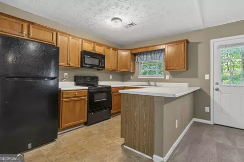 Kitchen - 10 Ratliff Dr, Covington, GA 30016 photo 3 of 3