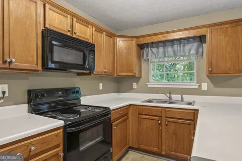 Kitchen - 10 Ratliff Dr, Covington, GA 30016 photo 2 of 3